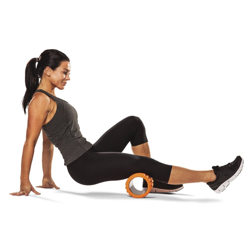 Image depicting a woman using a Foam Roller