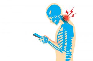 Image depicting someone looking down at their phone which causes Text Neck