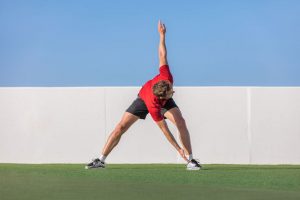 Image of a man performing Dynamic stretching