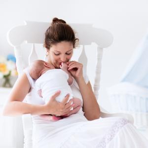 Image of a baby and a her new mums