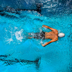 Image of a man performing swimming exercise