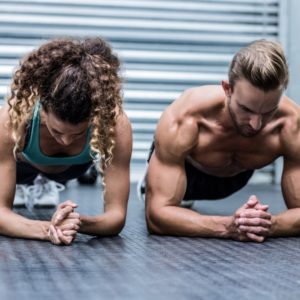 Image of a man and a woman doing a quick workout