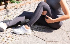 Image depicting a woman with a hamstring strain