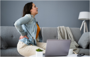 Image of a woman suffering from lower back pain